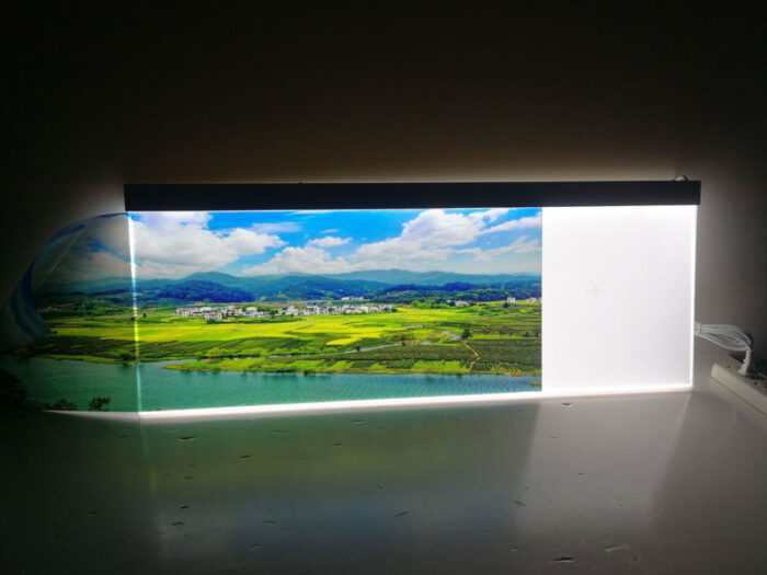hanging double-sided slide in acrylic lightbox