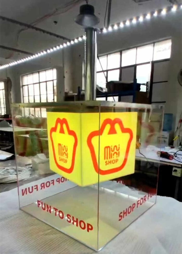 ceiling hanging clear cube rotating acrylic lightbox with yellow LED