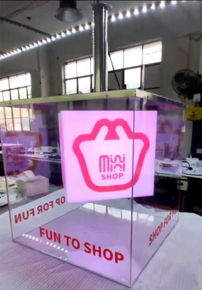 ceiling hanging clear cube rotating acrylic lightbox with pink LED