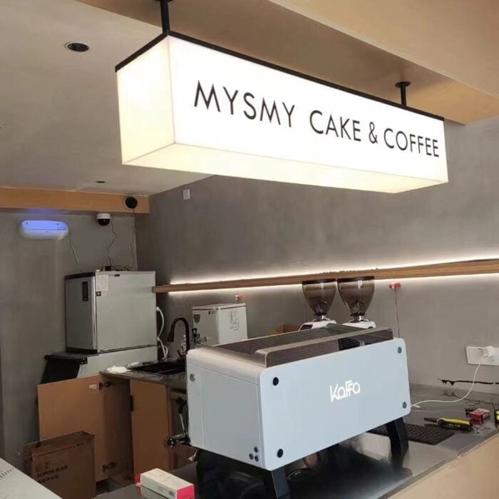 suspended rectangle acrylic lightbox sign in coffee shop