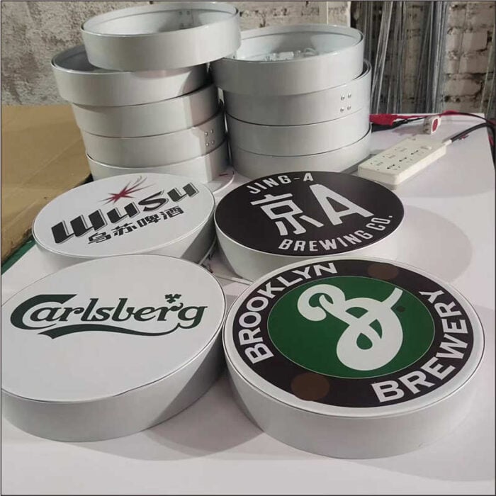 circular fabric light boxes custom printed with various logos
