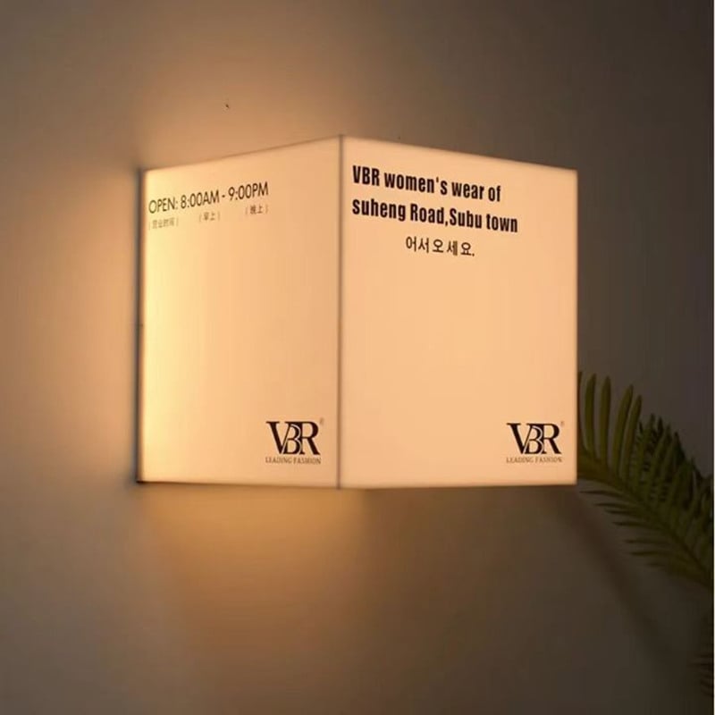 acrylic led cube on wall with warm light