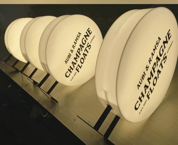 bulk produced round acrylic light box signs with warm light